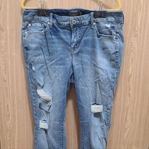 Torrid boyfriend blue distressed Jean with vintage stretch size 16